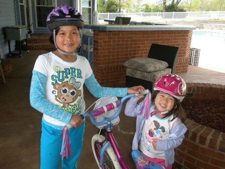 Kasen and Karis with their bikes